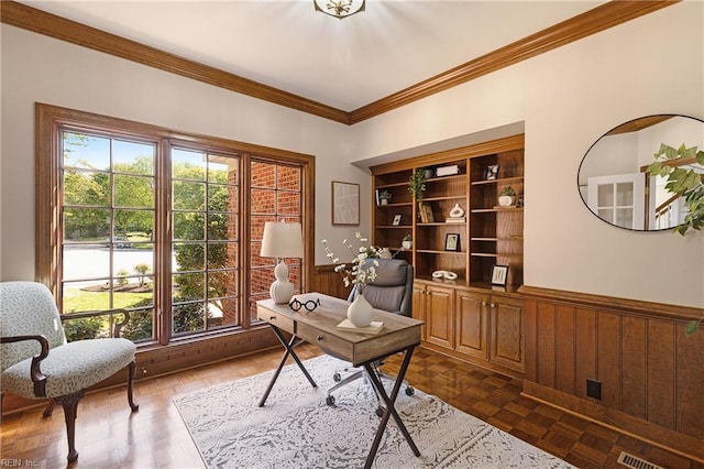 office featuring ornamental molding, wooden walls, and dark parquet floors