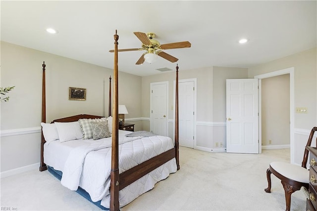 carpeted bedroom featuring ceiling fan