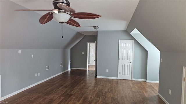 additional living space featuring lofted ceiling, ceiling fan, and dark wood-type flooring