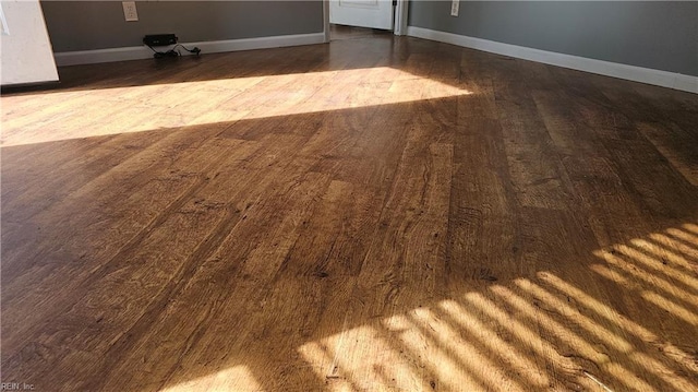 interior details featuring hardwood / wood-style flooring