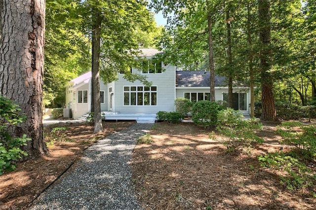 view of front of house featuring cooling unit