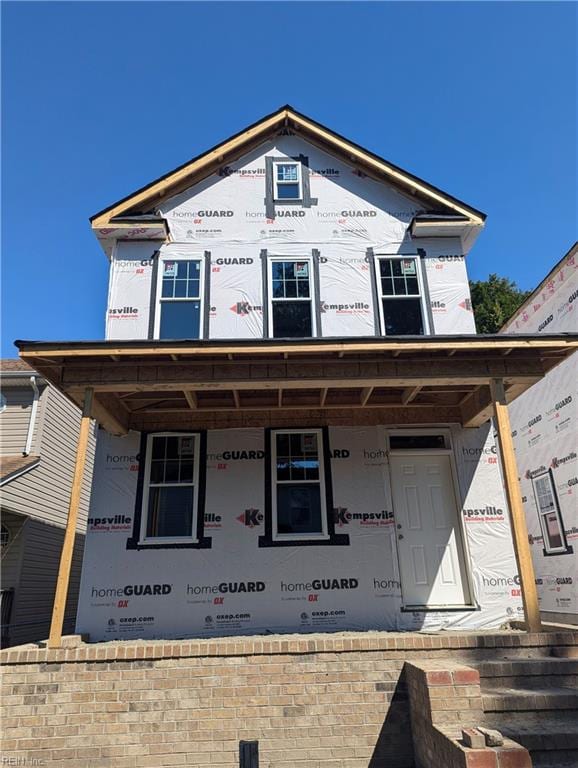 property under construction with a porch