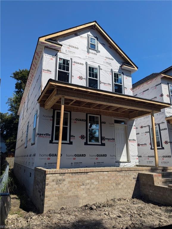 property under construction with a porch