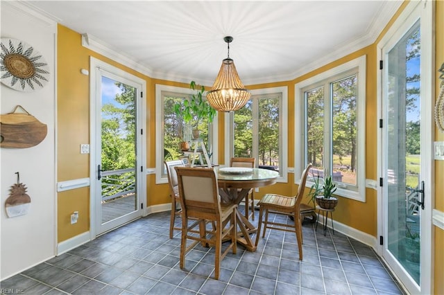 sunroom with a notable chandelier