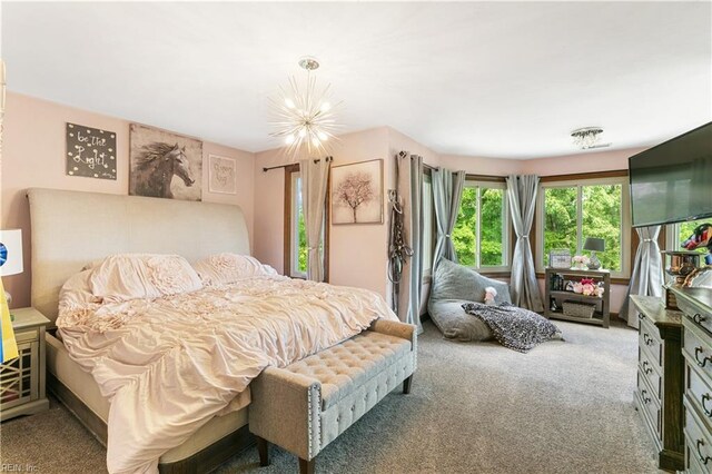 living area featuring a wealth of natural light and light carpet