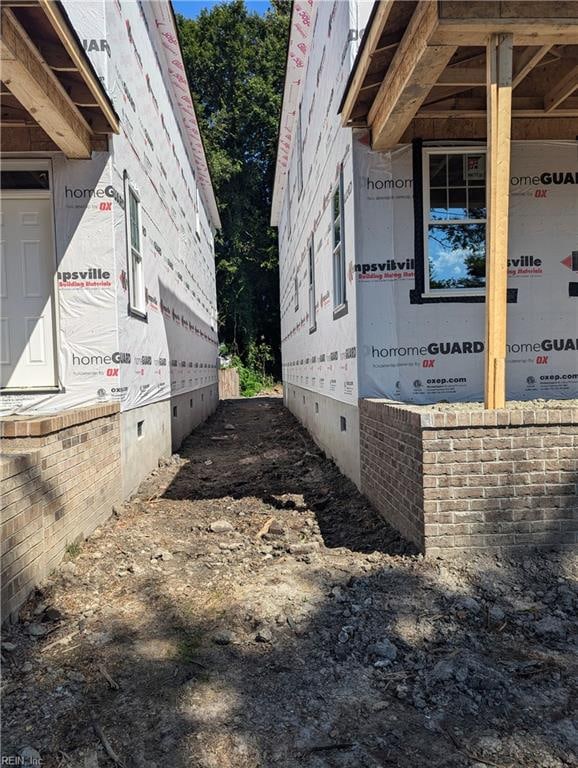 view of property exterior with crawl space