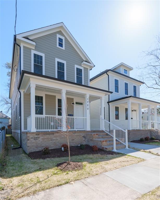 traditional style home featuring covered porch