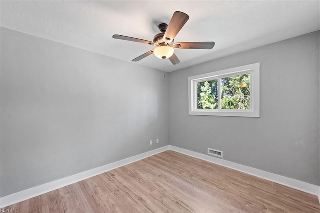 unfurnished room with ceiling fan and light hardwood / wood-style floors