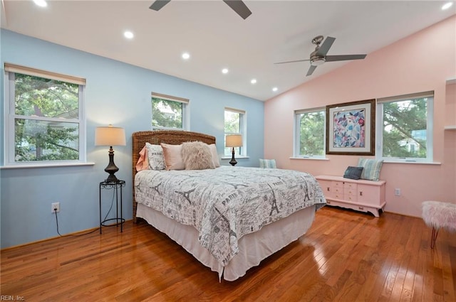 bedroom featuring vaulted ceiling, wood-type flooring, and ceiling fan