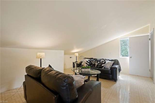 living room with lofted ceiling