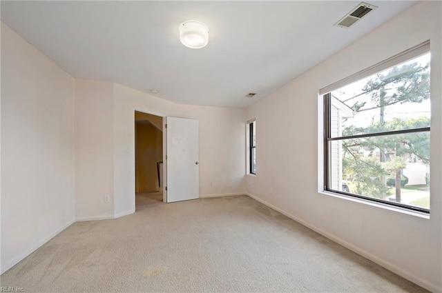 unfurnished bedroom with light carpet