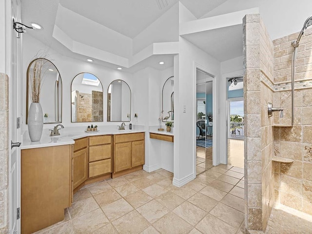 bathroom with tile patterned flooring and vanity