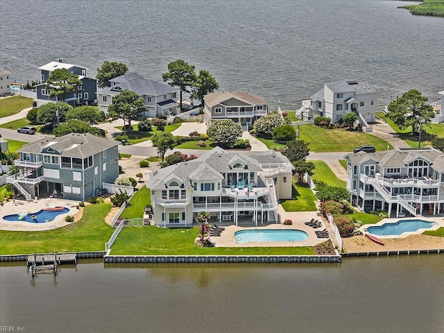 drone / aerial view with a water view