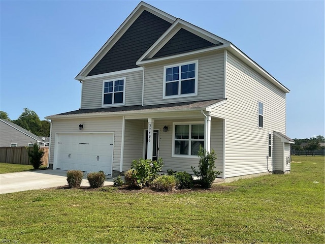 view of front facade featuring a front lawn and a garage