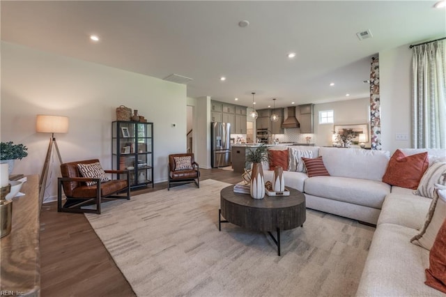 2226 Patrick Dr, Suffolk, VA 23435 - living room with recessed lighting, light wood-style floors, and visible vents