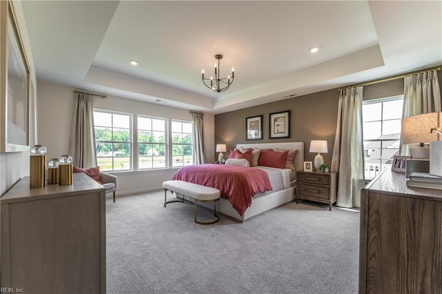 2226 Patrick Dr, Suffolk, VA 23435 - bedroom with a tray ceiling, light colored carpet, baseboards, a notable chandelier, and recessed lighting