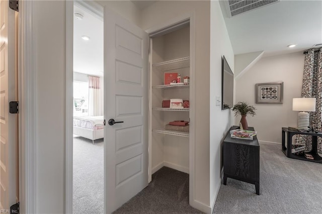 2226 Patrick Dr, Suffolk, VA 23435 - corridor featuring dark carpet, baseboards, visible vents, and recessed lighting