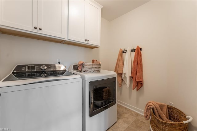 2226 Patrick Dr, Suffolk, VA 23435 - laundry room with cabinet space, washing machine and clothes dryer, and baseboards