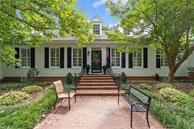 view of front of house with a patio area