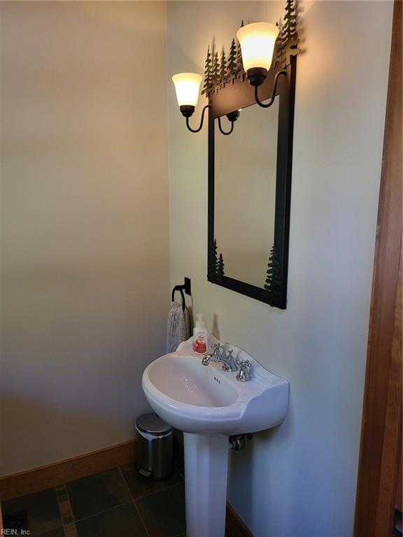 bathroom with tile patterned flooring