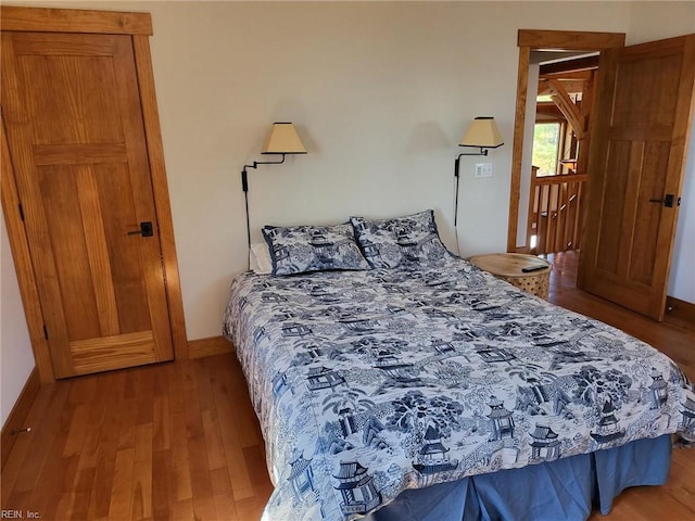 bedroom with light wood-type flooring