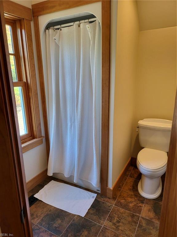 bathroom featuring toilet