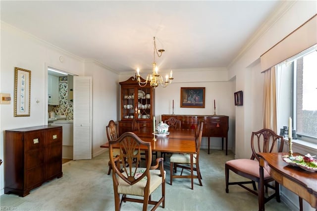 dining space featuring crown molding, light carpet, and a notable chandelier