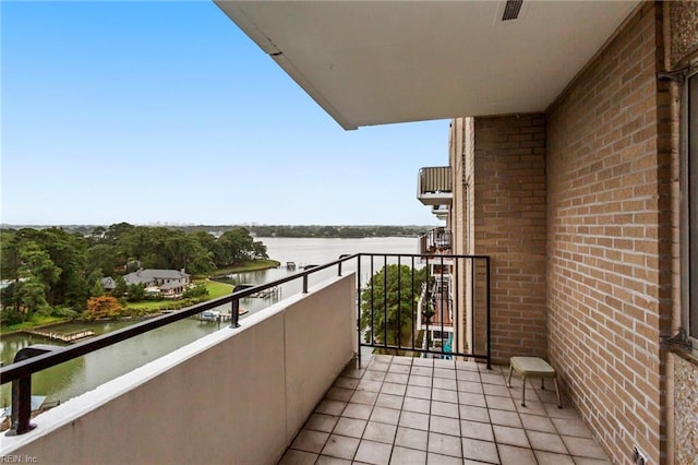 balcony featuring a water view