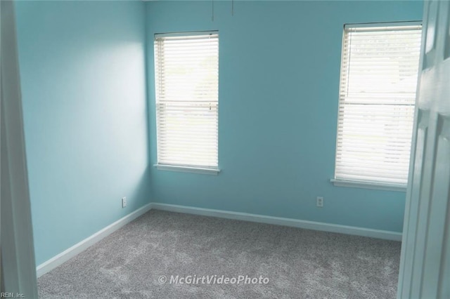 spare room with carpet flooring