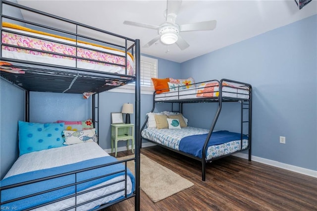 bedroom with ceiling fan and hardwood / wood-style floors