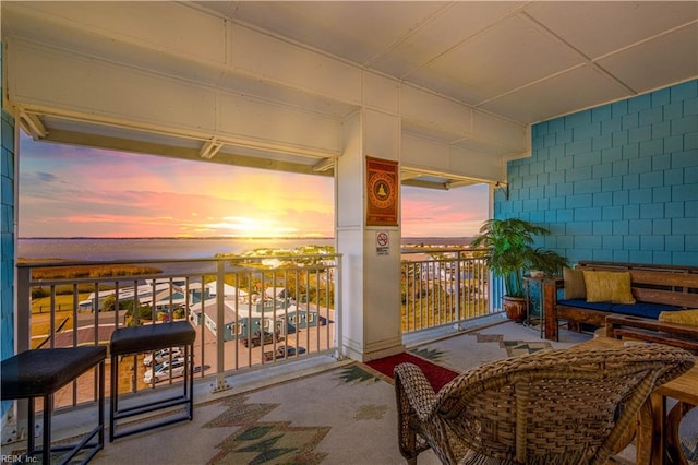 balcony at dusk with a water view