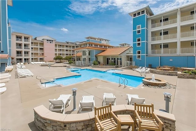 view of pool with a patio area