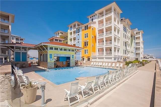 view of pool featuring a patio