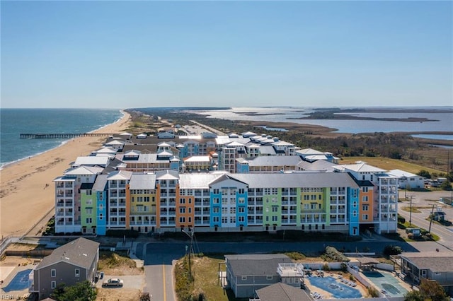 bird's eye view featuring a water view and a view of the beach