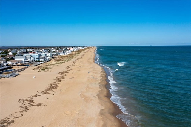 view of water feature with a beach view