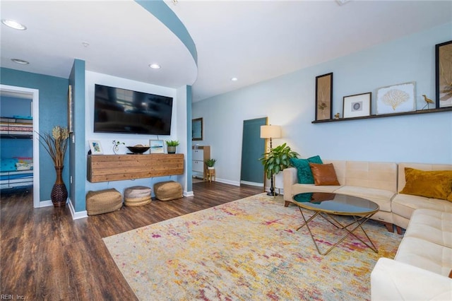 living room with dark hardwood / wood-style floors