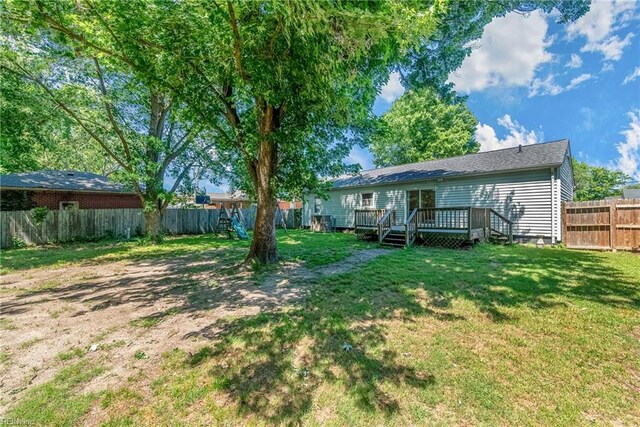 view of yard with a deck