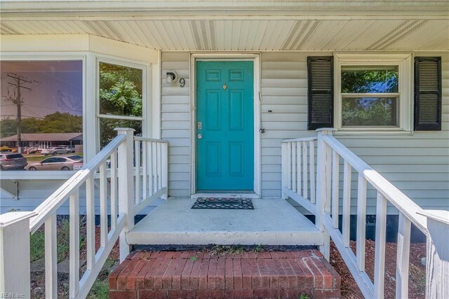 entrance to property with a porch