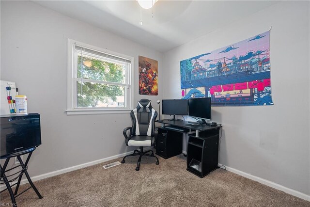 office area featuring ceiling fan and carpet floors