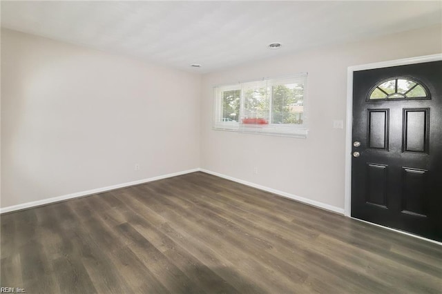 entrance foyer featuring dark hardwood / wood-style floors