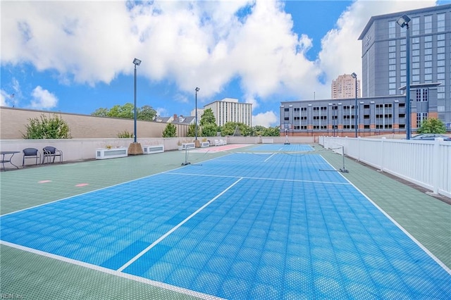 exterior space with tennis court