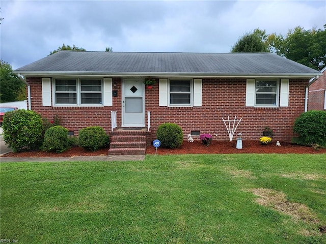 view of front of home featuring a front yard