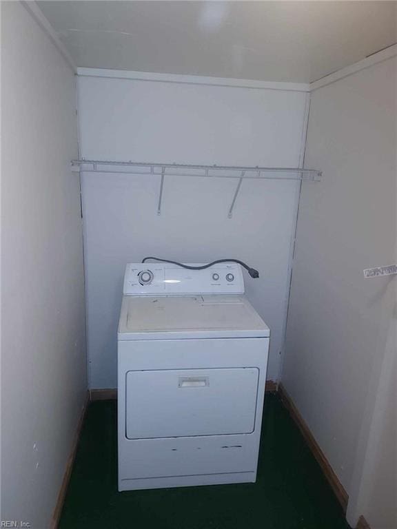 laundry room with washer / dryer