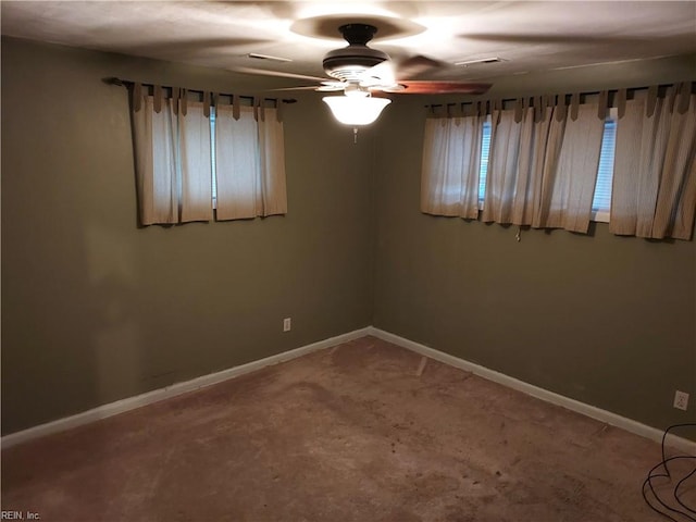 carpeted empty room with ceiling fan