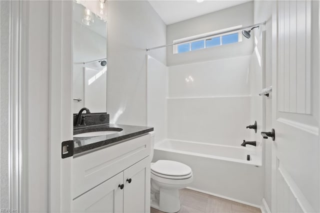 full bathroom with vanity, shower / bath combination, and toilet