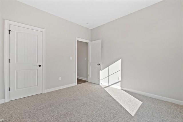 unfurnished bedroom with carpet