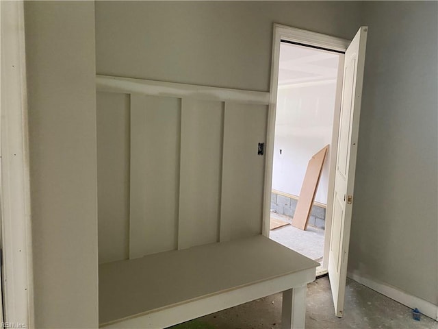 mudroom featuring concrete flooring