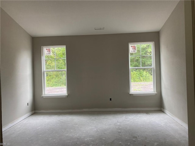 unfurnished room with a wealth of natural light