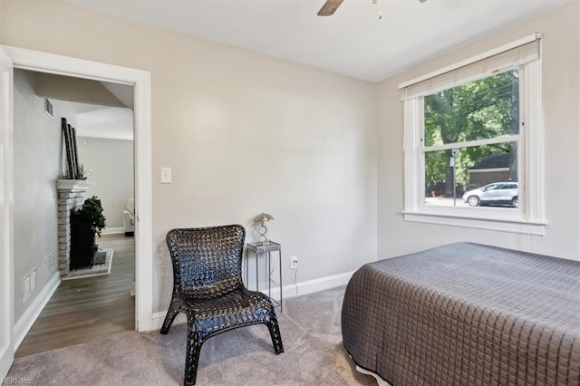 bedroom featuring hardwood / wood-style floors and ceiling fan