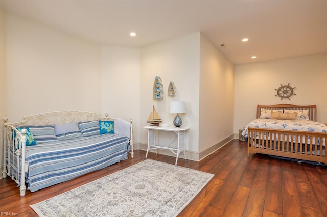 bedroom featuring dark hardwood / wood-style floors